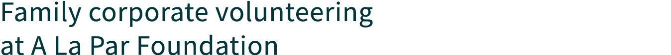 Family corporate volunteering at A La Par Foundation